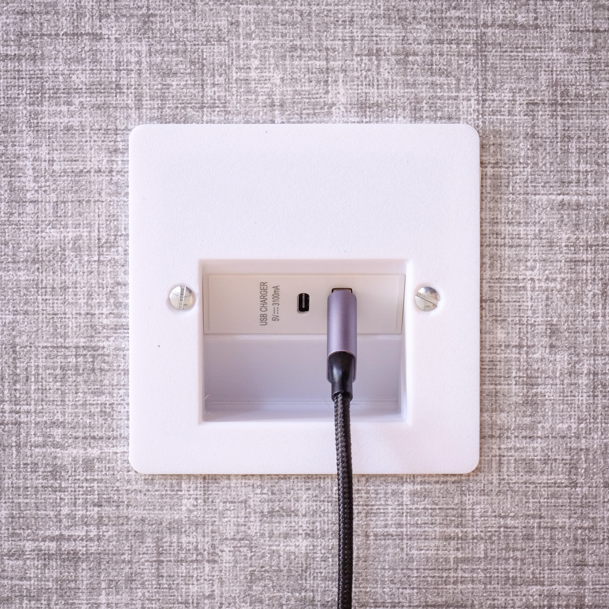 Recessed angled USB Euro module faceplate